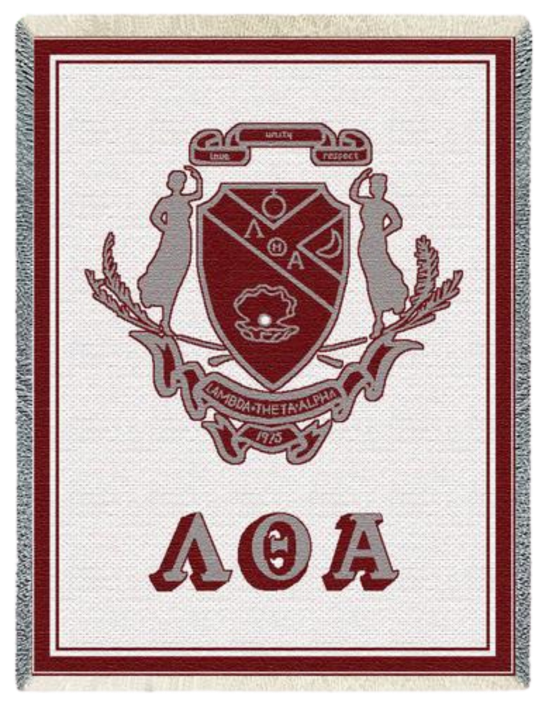Lambda Theta Alpha woven cotton afghan throw blanket in burgundy and grey LTA colors, folded to show crest design and fringe edge